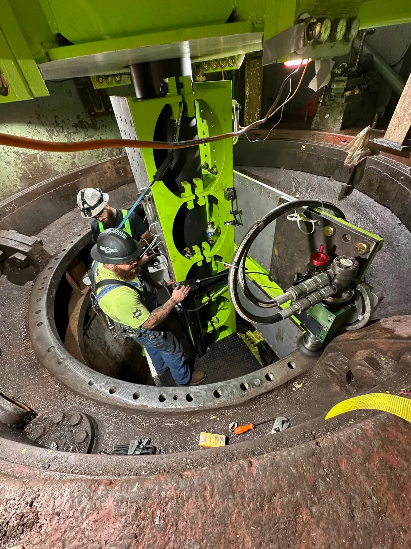 Portable field machining setup at a hydro site.
